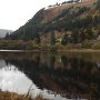 Admire the natural beauty. Lower lake at Glendalough